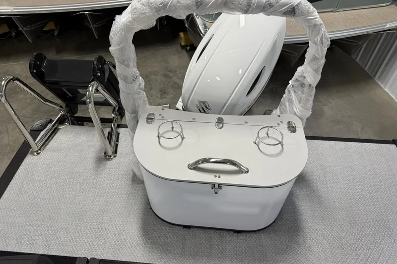 Slide: The Image of 2026 Avalon LSZ Quad Lounge boat interior with wrapped components and stainless steel fittings. - 22