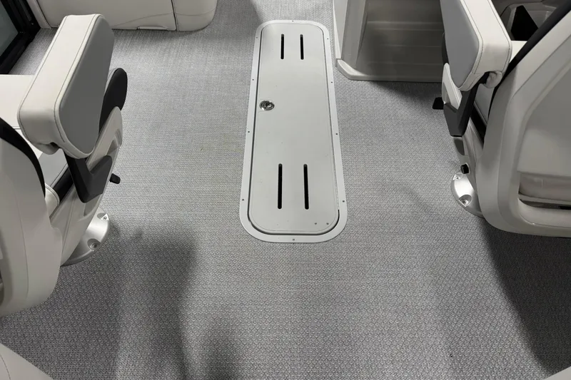 Slide: The Image of 2026 Avalon LSZ Quad Lounge interior with gray carpet and white seating. - 23