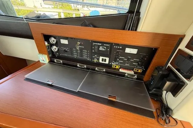 Slide: The Image of Luxurious interior of a 2015 Prestige 500 yacht with modern furnishings and panoramic windows. - 27