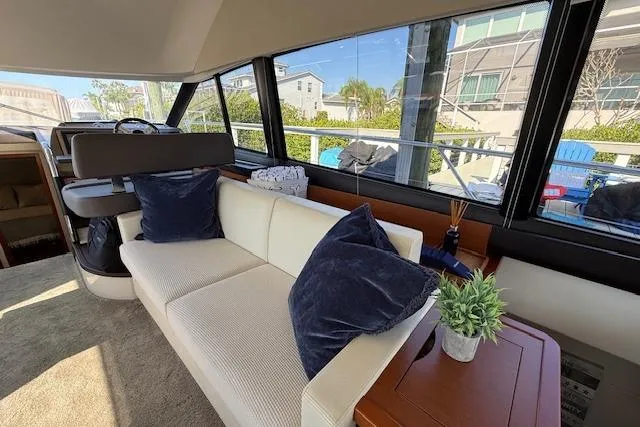 Slide: The Image of Open cabinet with glassware and cups on a Prestige 500 yacht, 2015 model. - 32