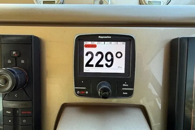 Slide: The Image of Luxurious interior of a 2015 Prestige 500 yacht with plush seating and elegant decor. - 38