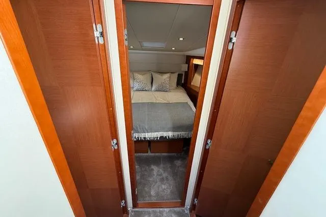 Slide: The Image of Dashboard of a 2015 Prestige 500 yacht with navigation and engine display. - 42