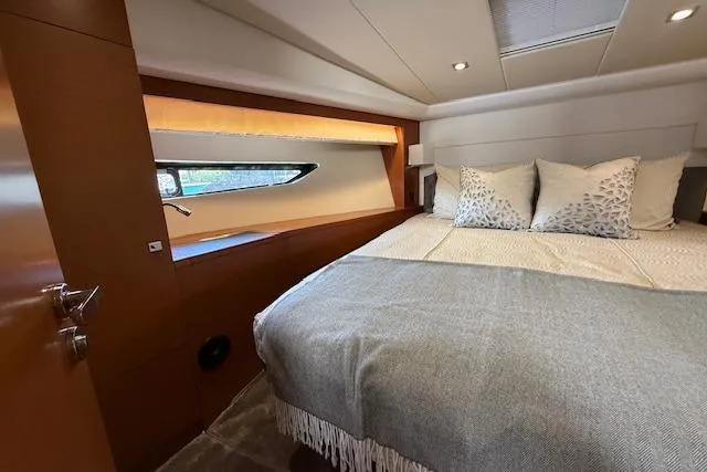 Slide: The Image of Raymarine navigation display on 2015 Prestige 500 yacht showing 229-degree heading. - 44