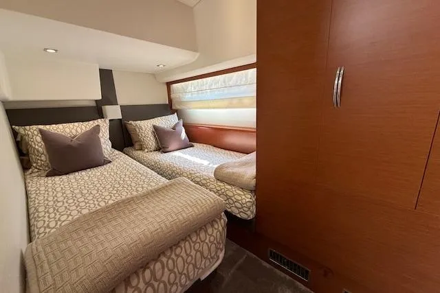 Slide: The Image of Control panel of a 2015 Prestige 500 yacht with communication devices and navigation controls. - 46