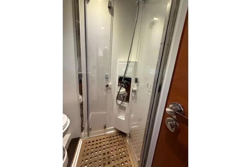 Slide: The Image of Luxurious cabin interior of 2015 Prestige 500 yacht with cozy bedding and modern design. - 50