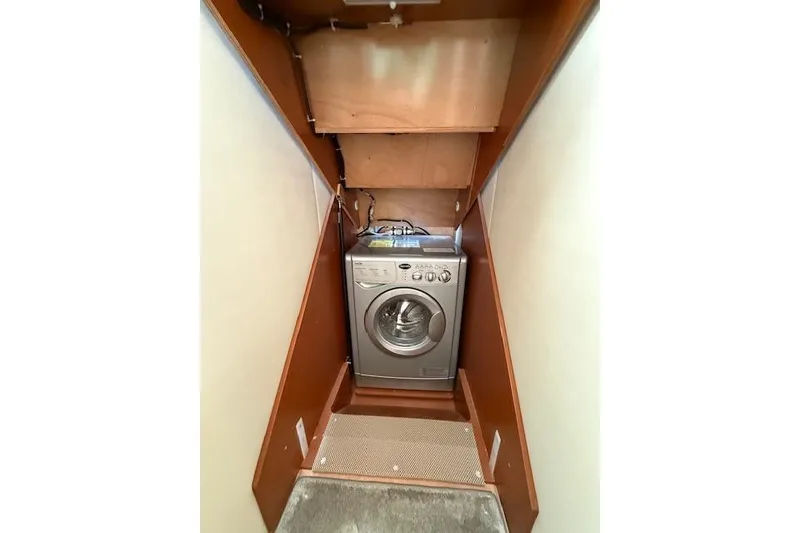 Slide: The Image of Luxurious cabin interior of a 2015 Prestige 500 yacht with modern wood finishes. - 51