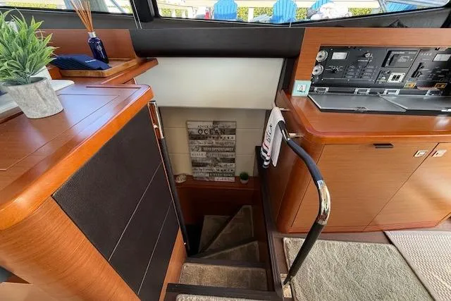 Slide: The Image of Luxurious twin cabin interior of a 2015 Prestige 500 yacht with modern decor. - 52