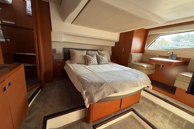 Slide: The Image of Luxurious bathroom in a 2015 Prestige 500 yacht, featuring modern sink and elegant fixtures. - 55