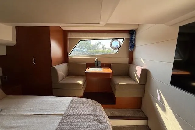 Slide: The Image of Compact laundry area with a washing machine inside a wooden cabinet, Prestige 500, 2015 model. - 57