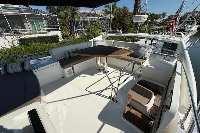 Slide: The Image of Luxurious interior of a 2015 Prestige 500 yacht with elegant bedroom and modern amenities. - 62