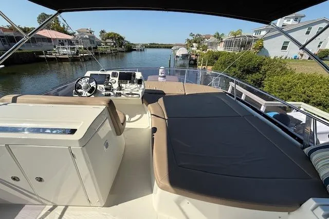 Slide: The Image of Interior of a 2015 Prestige 500 yacht with wooden cabinetry and modern decor. - 64