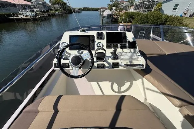 Slide: The Image of Luxurious bathroom in a 2015 Prestige 500 yacht, featuring modern fixtures and elegant design. - 66