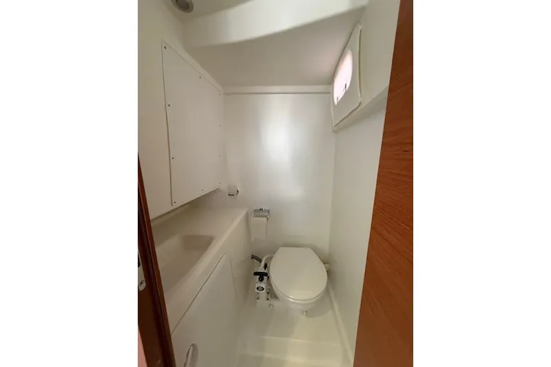 Slide: The Image of Prestige 500 yacht dashboard display showing engine metrics and speed in knots. - 75