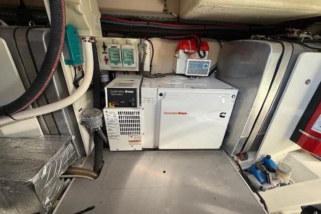 Slide: The Image of Compact bathroom in a 2015 Prestige 500 yacht, featuring a toilet and sink. - 81