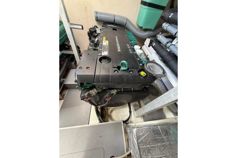 Slide: The Image of Volvo Penta engine in a 2015 Prestige 500 yacht, showcasing mechanical components. - 84