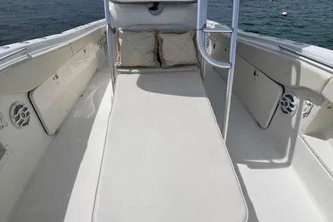 Slide: The Image of 2005 Hydra-Sports Vector 3300 CC boat interior with cushioned seating and open deck. - 15