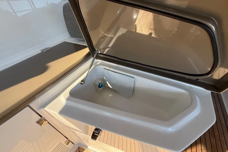 Slide: The Image of Open storage compartment on 2018 Azimut Atlantis 43 yacht, featuring sleek design and modern amenities. - 11