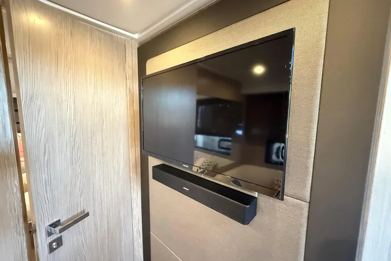 Slide: The Image of Flat-screen TV and soundbar in 2018 Azimut Atlantis 43 yacht interior. - 16