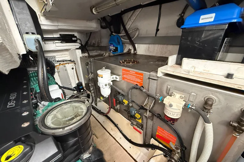 Slide: The Image of Engine room of 2018 Azimut Atlantis 43 yacht, showcasing mechanical components and systems. - 25