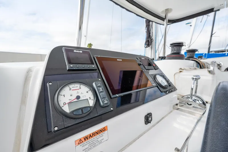 Slide: The Image of Control panel of a 2018 Lagoon 42 catamaran with navigation instruments. - 36