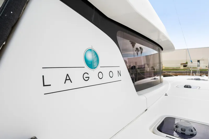 Slide: The Image of 2018 Lagoon 42 catamaran exterior with logo. - 37