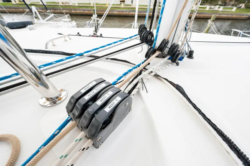 Slide: The Image of Close-up of rigging and control lines on a 2018 Lagoon 42 catamaran. - 46