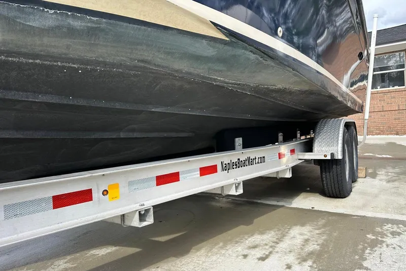 Slide: The Image of Trailer carrying a 2000 Albin 28 Tournament Express boat at Naples Boat Mart. - 27