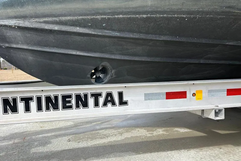 Slide: The Image of Albin 28 Tournament Express 2000 boat on Continental trailer, close-up view. - 29