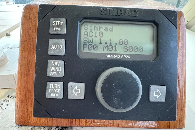 Slide: The Image of Simrad AP26 autopilot control on 2000 Albin 28 Tournament Express boat dashboard. - 37