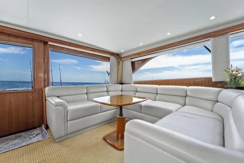 Slide: The Image of Luxurious interior of 2005 Viking 61 Convertible yacht with ocean view and plush seating. - 16