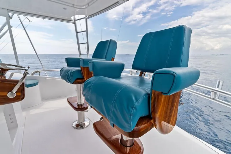 Slide: The Image of Luxurious seating on 2005 Viking 61 Convertible yacht, overlooking the ocean. - 33
