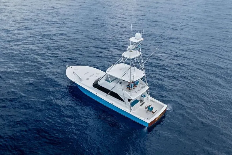 Slide: The Image of Aerial view of 2005 Viking 61 Convertible yacht on open ocean. - 58