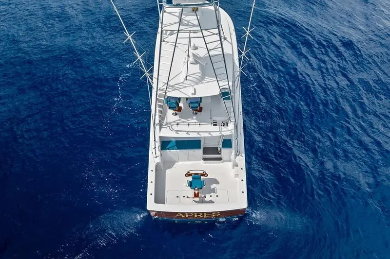 Slide: The Image of Aerial view of 2005 Viking 61 Convertible yacht on deep blue ocean. - 59