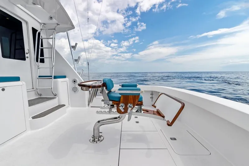 Slide: The Image of 2005 Viking 61 Convertible yacht deck with ocean view and fishing chair. - 68