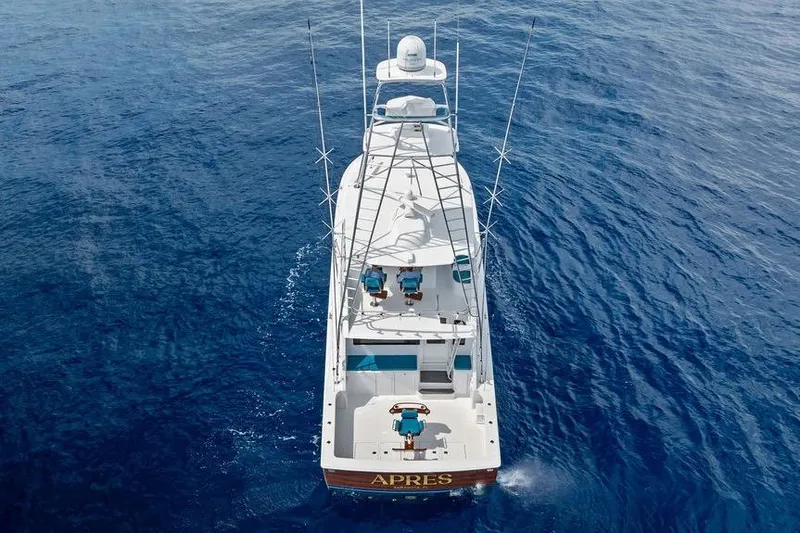 Slide: The Image of Aerial view of 2005 Viking 61 Convertible yacht cruising on open water. - 78