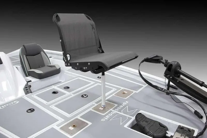 Slide: The Image of Manufacturer Provided Image: 2026 Xpress H18C Crappie boat interior with seating and trolling motor. - 6