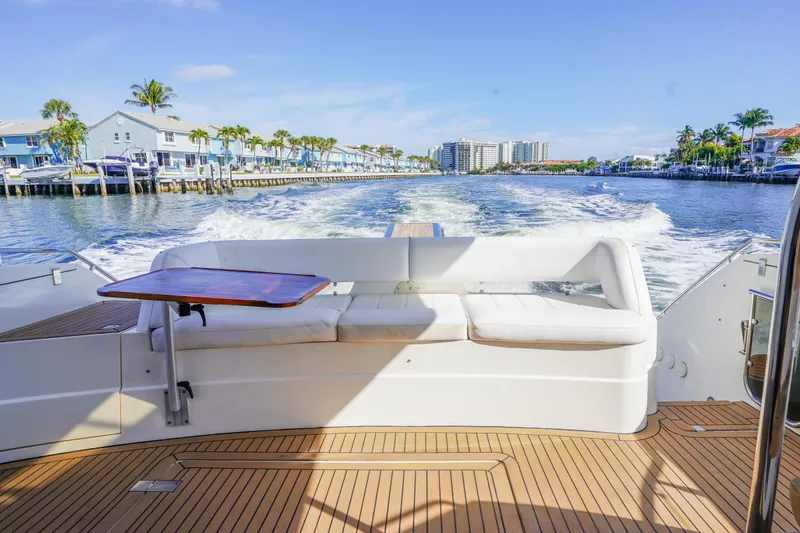 Slide: The Image of Luxury 2009 Fairline 48 Phantom yacht cruising with scenic waterfront view. - 12