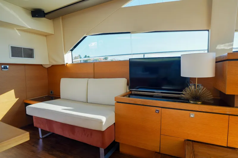 Slide: The Image of Interior of 2009 Fairline 48 Phantom yacht with sofa, TV, and lamp. - 16