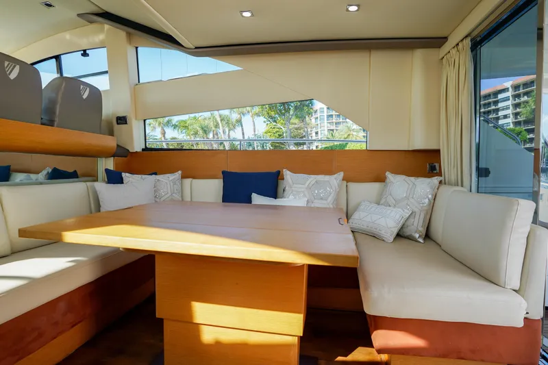 Slide: The Image of Luxurious interior of 2009 Fairline 48 Phantom yacht with elegant seating and cushions. - 17