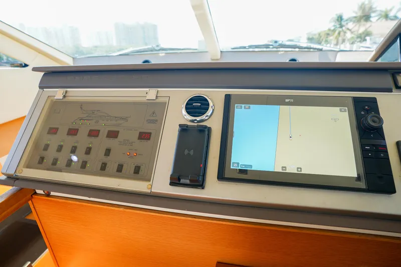 Slide: The Image of Control panel of 2009 Fairline 48 Phantom yacht with navigation display. - 21