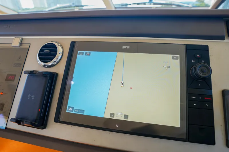 Slide: The Image of Navigation system on 2009 Fairline 48 Phantom yacht dashboard, displaying map and controls. - 22