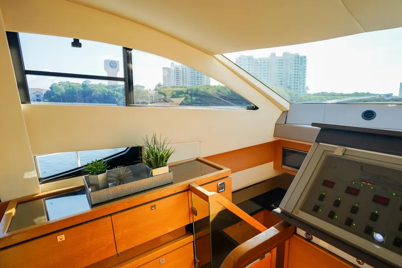 Slide: The Image of Interior of 2009 Fairline 48 Phantom yacht with modern design and scenic window view. - 23