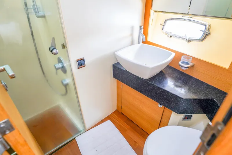 Slide: The Image of Luxurious bathroom in 2009 Fairline 48 Phantom yacht with modern fixtures and shower. - 35