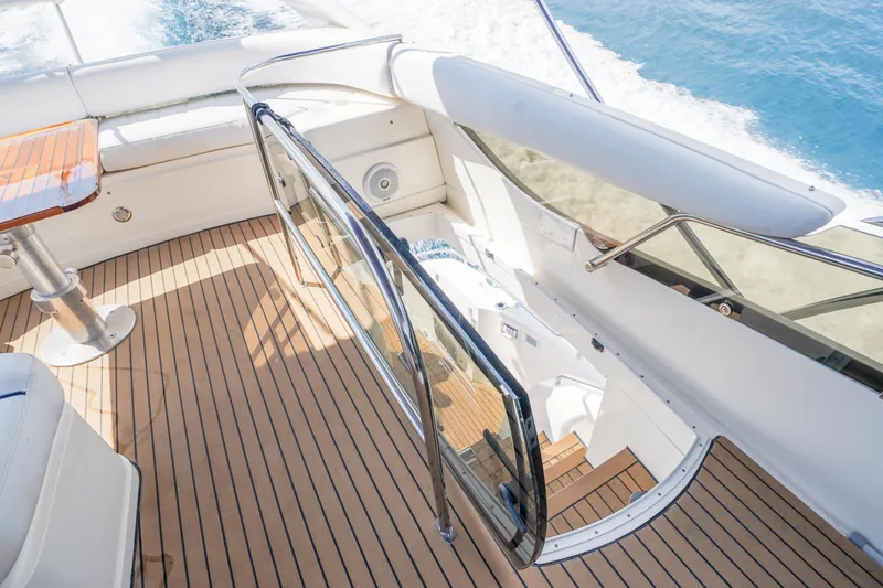 Slide: The Image of 2009 Fairline 48 Phantom yacht deck with wooden flooring and ocean view. - 45