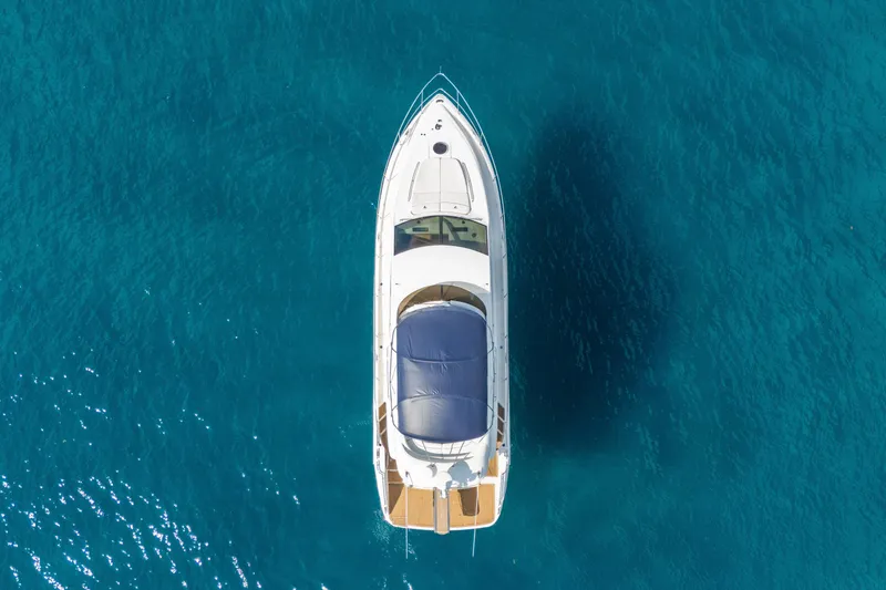 Slide: The Image of Aerial view of 2009 Fairline 48 Phantom yacht on clear blue water. - 8