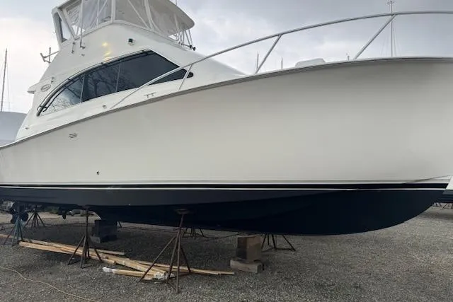 Slide: The Image of 1998 Ocean Yachts 40 Super Sport boat on stands, side view. - 3