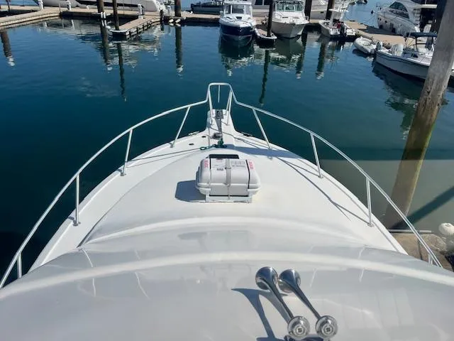 Slide: The Image of Bow view of 1998 Ocean Yachts 40 Super Sport at marina. - 6