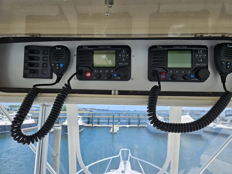 Slide: The Image of Control panel of a 1998 Ocean Yachts 40 Super Sport with marine radios. - 14