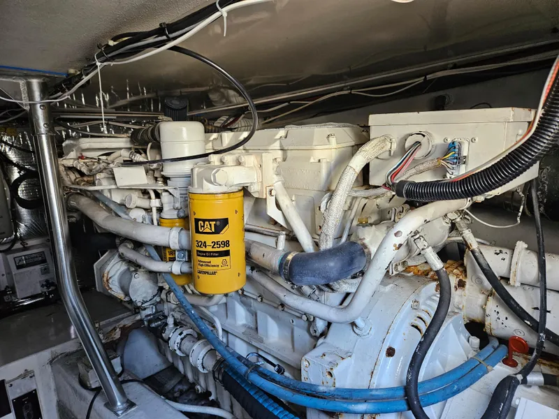 Slide: The Image of Engine room of 1998 Ocean Yachts 40 Super Sport with CAT marine engine. - 24