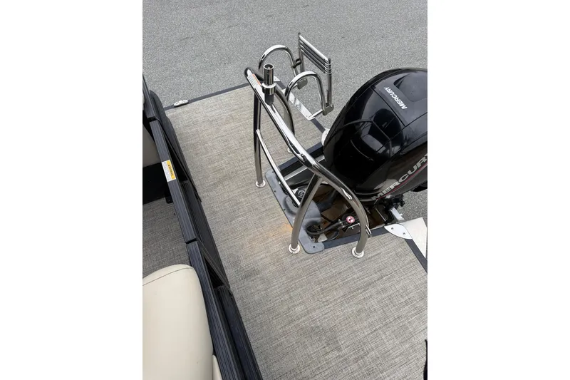 Slide: The Image of 2021 Barletta C22QC boat with Mercury outboard motor and stainless steel railing. - 12